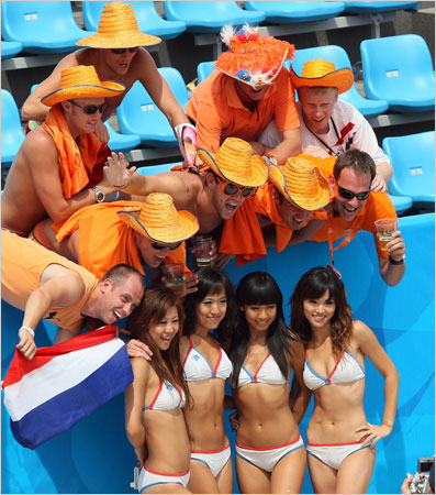 Dutch fans "drink" it in. (Photo credit–Thomas Coex/Agence France-Presse–Getty Images)